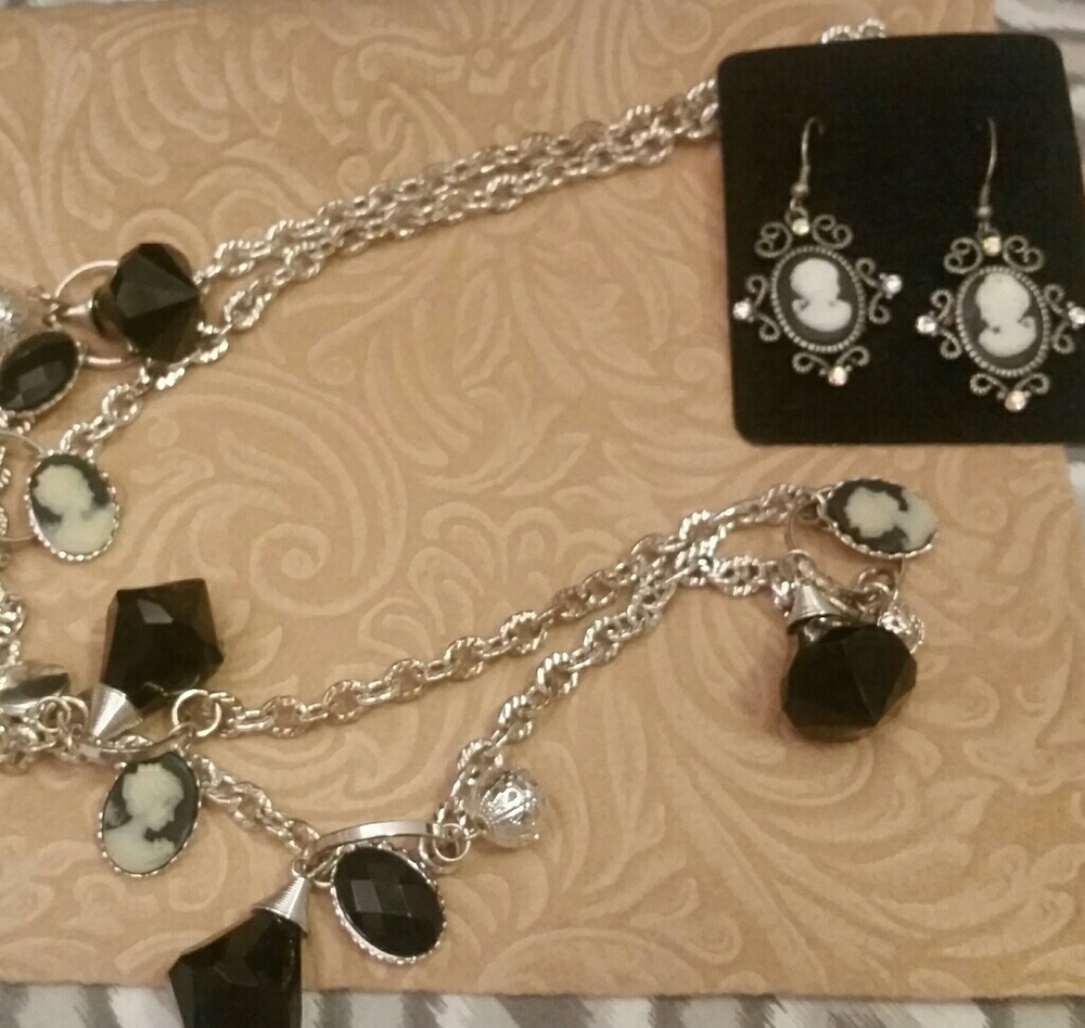 Silver tone classy necklace with cameo accents